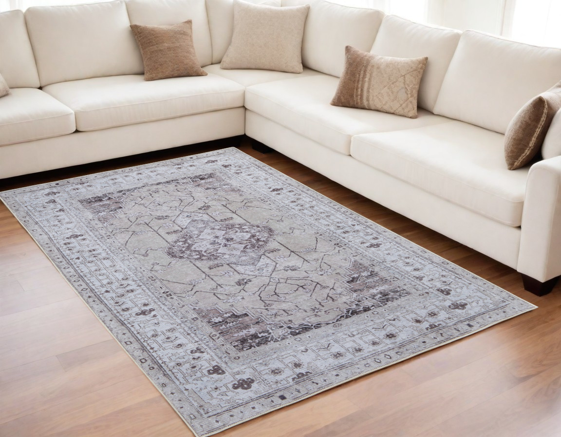 5" X 8" Gray Tan and Ivory Oriental Power Loom Worn Faded Washable Area Rug