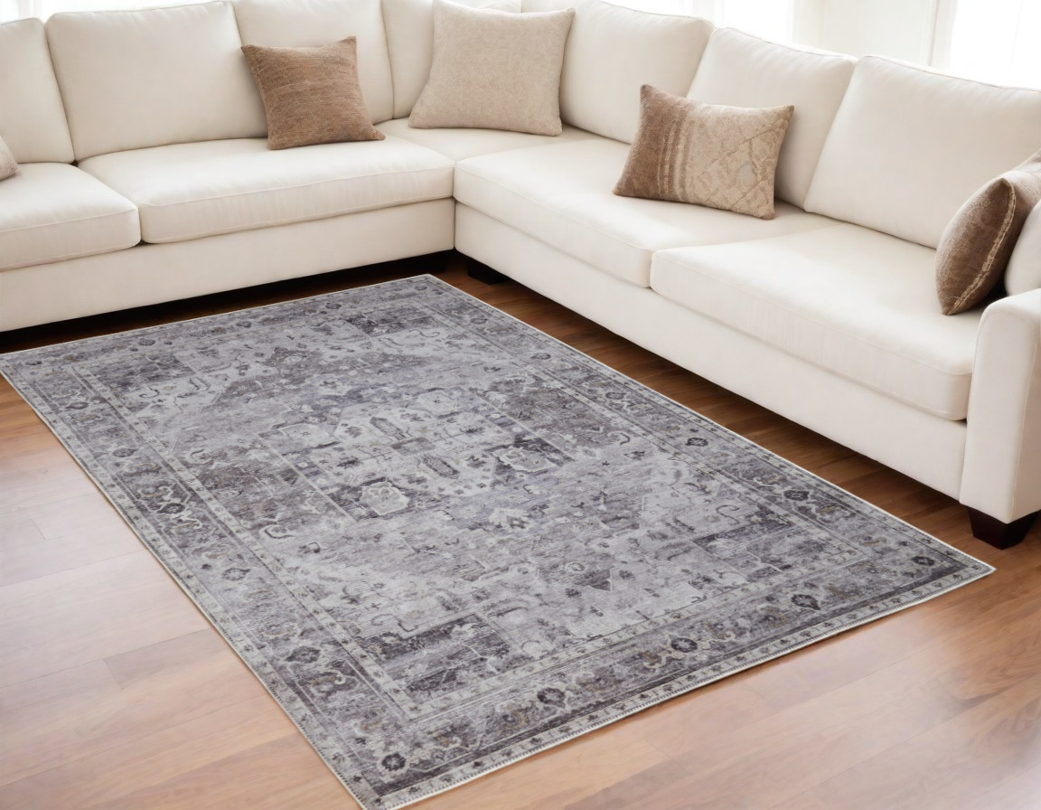 5" X 8" Gray and Ivory Oriental Power Loom Worn Faded Washable Area Rug