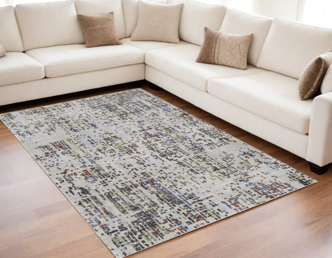 5" X 8" Ivory Green and Blue Abstract Power Loom Area Rug