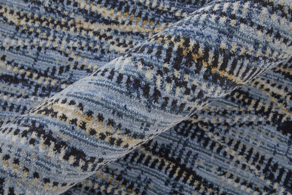 2" X 3" Blue Ivory and Tan Abstract Power Loom Area Rug