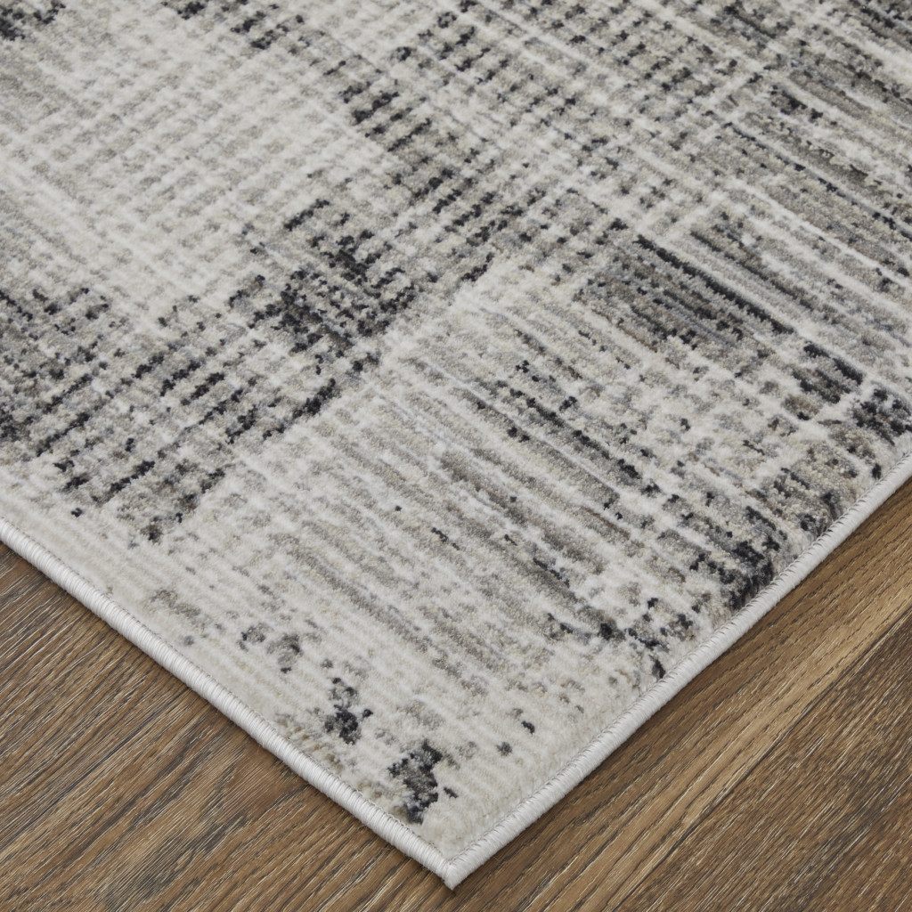 5" X 8" Gray and Ivory Abstract Power Loom Area Rug