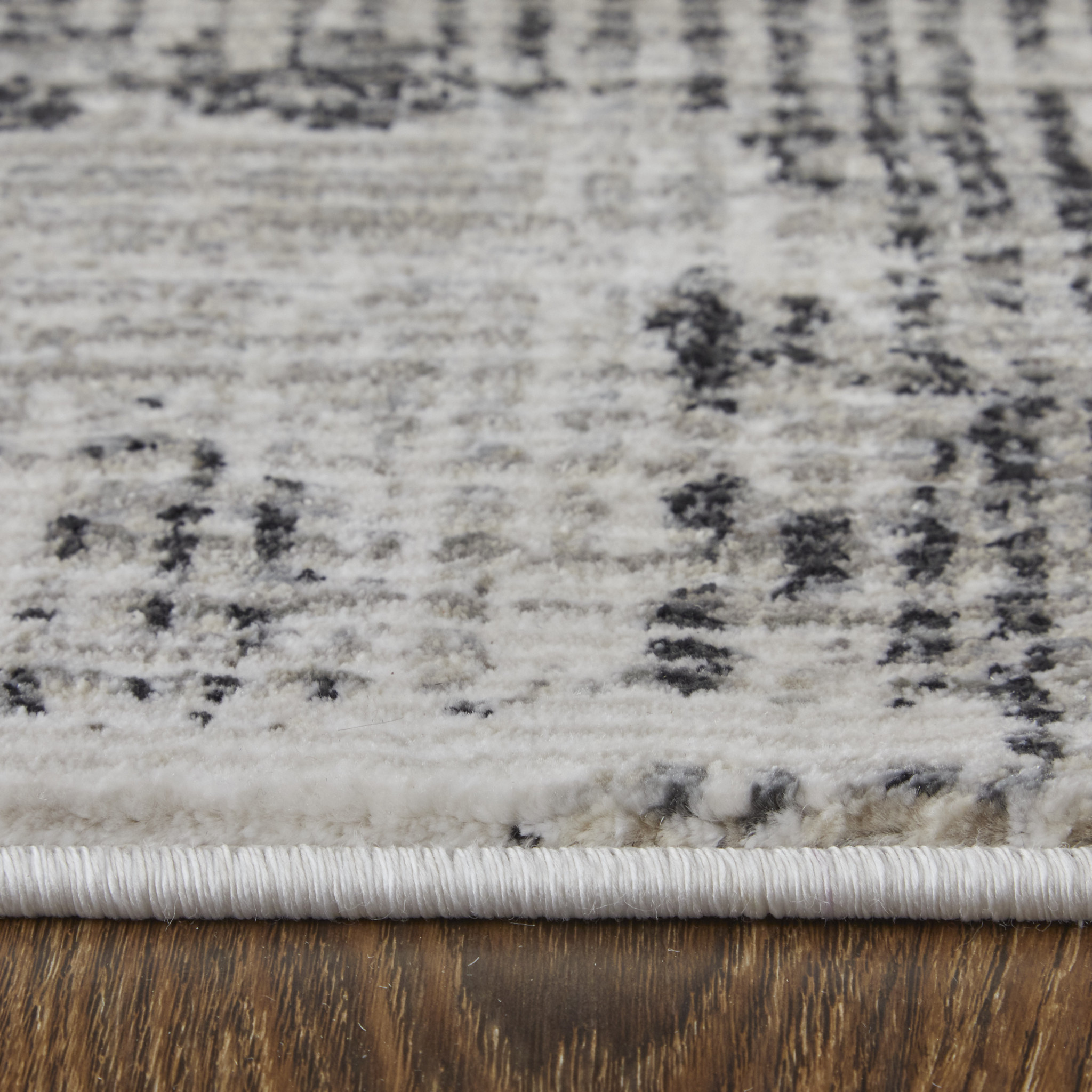 2" X 3" Gray and Ivory Abstract Power Loom Area Rug
