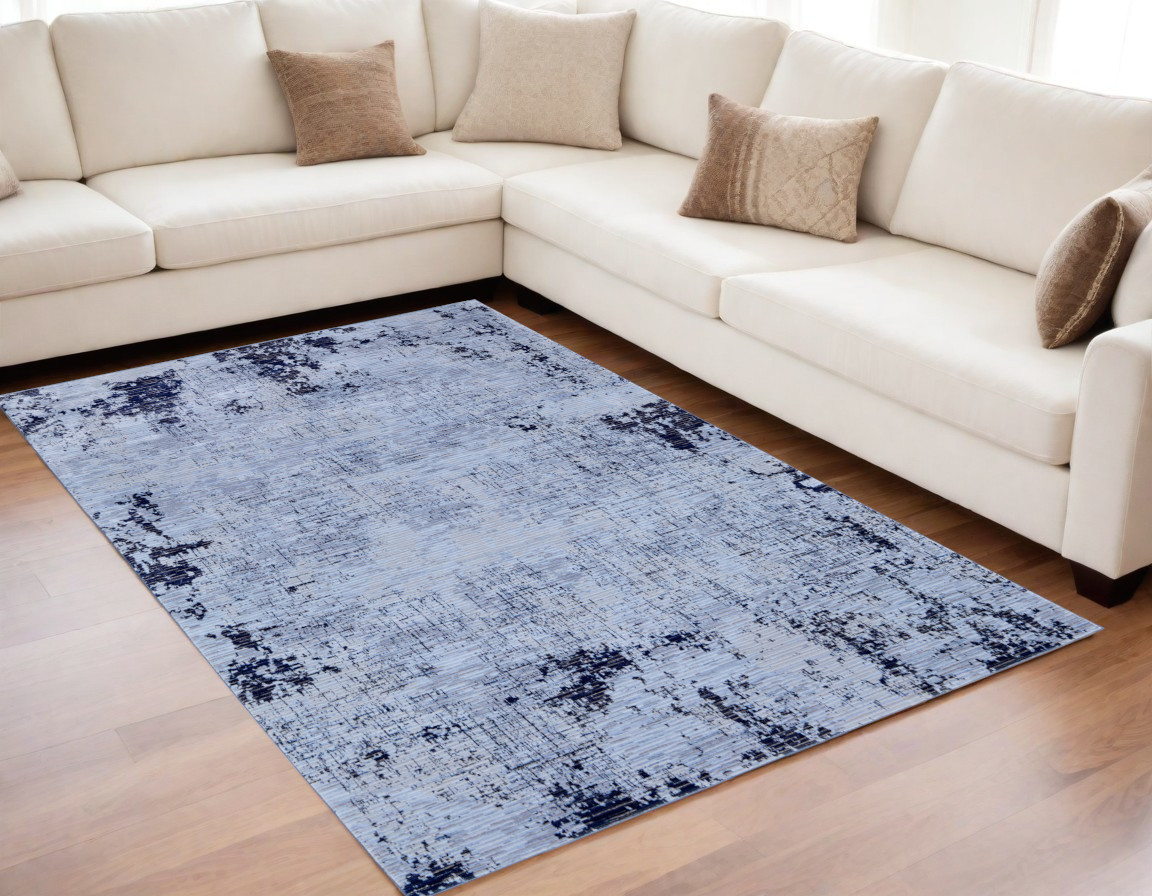 5" X 8" Light Blue and Black Abstract Power Loom Area Rug
