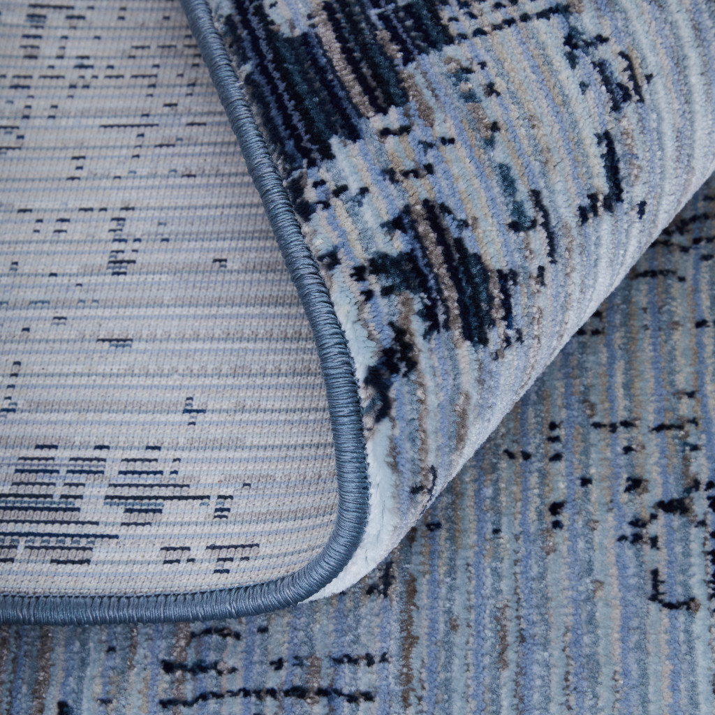 7" X 10" Light Blue and Black Abstract Power Loom Area Rug