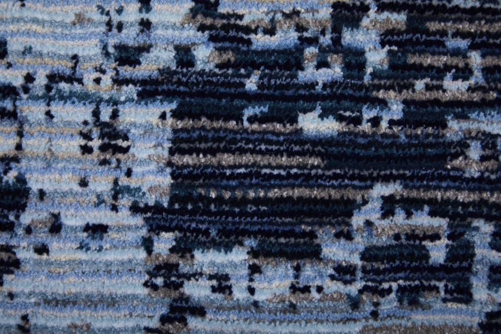 2" X 3" Light Blue and Black Abstract Power Loom Area Rug
