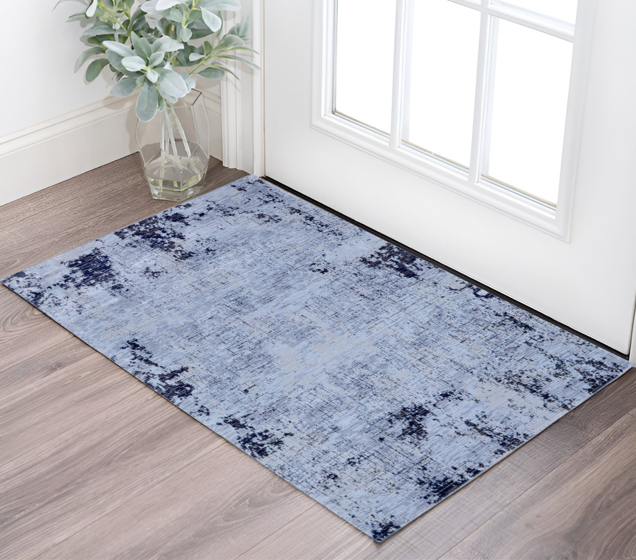 2" X 3" Light Blue and Black Abstract Power Loom Area Rug