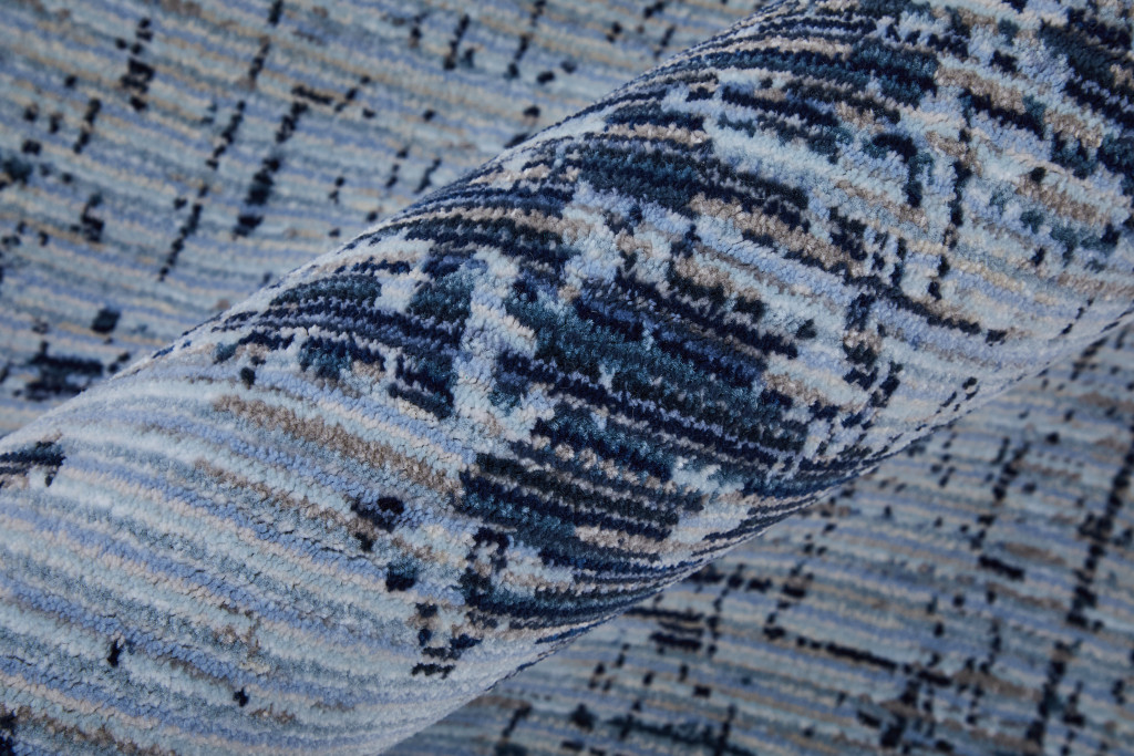 2" X 3" Light Blue and Black Abstract Power Loom Area Rug