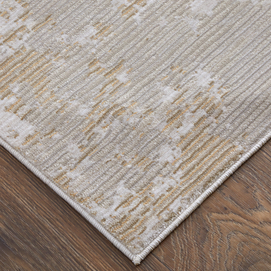 2" X 3" Gray Brown and Ivory Abstract Power Loom Area Rug