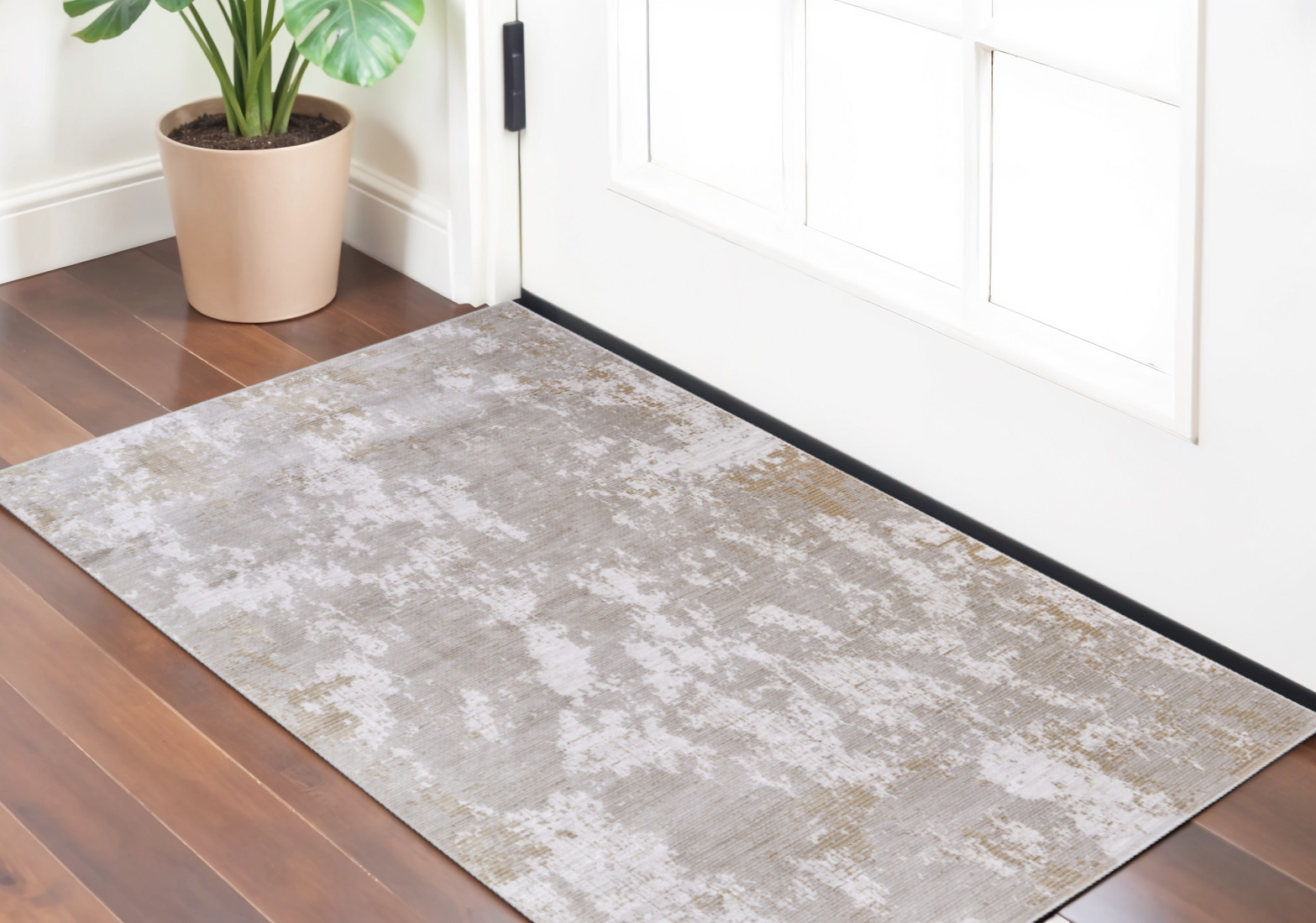 2" X 3" Gray Brown and Ivory Abstract Power Loom Area Rug