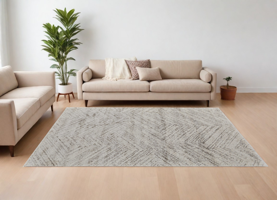 7" X 10" Ivory and Brown Geometric Power Loom Area Rug