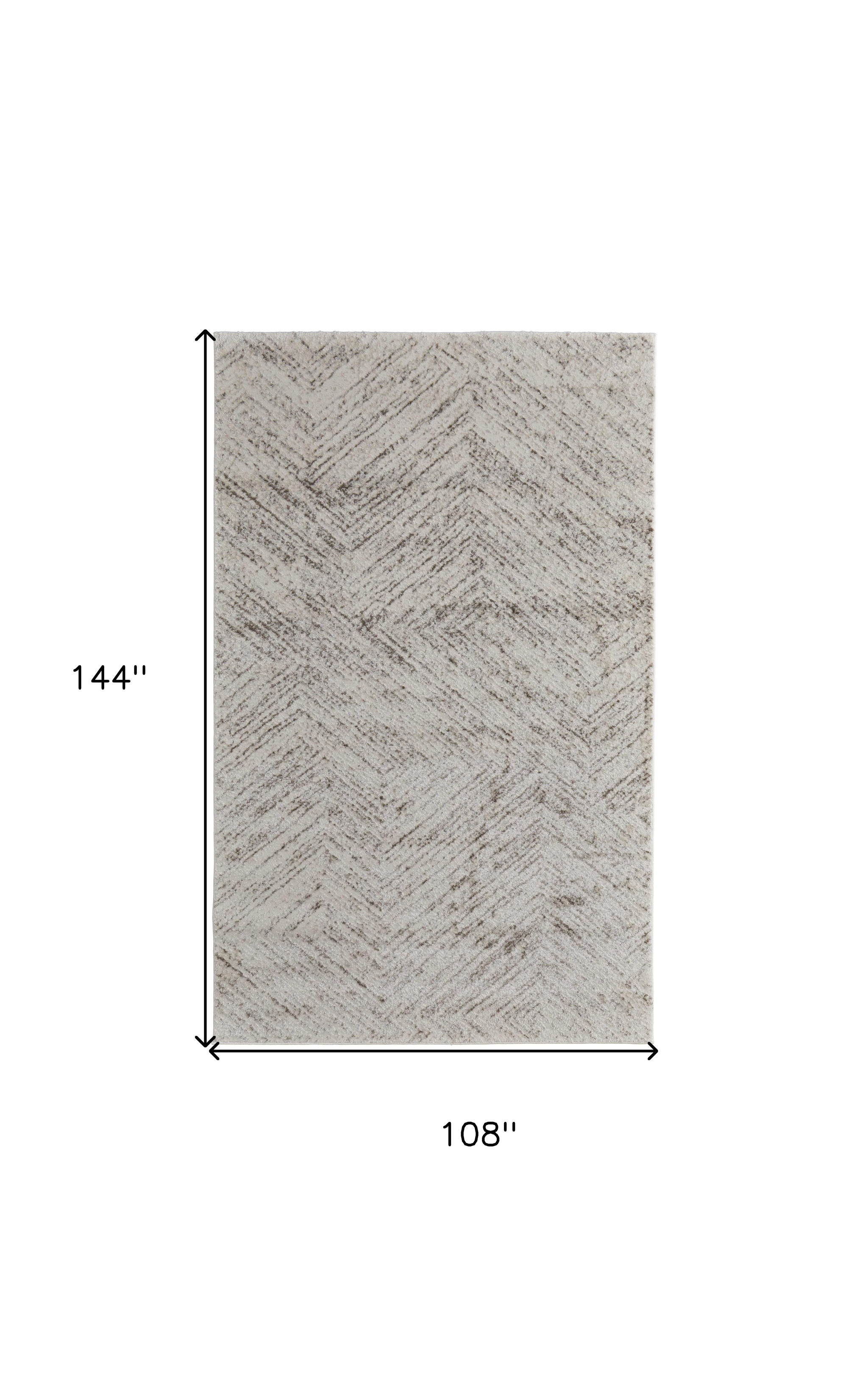 9" X 12" Ivory and Brown Geometric Power Loom Area Rug