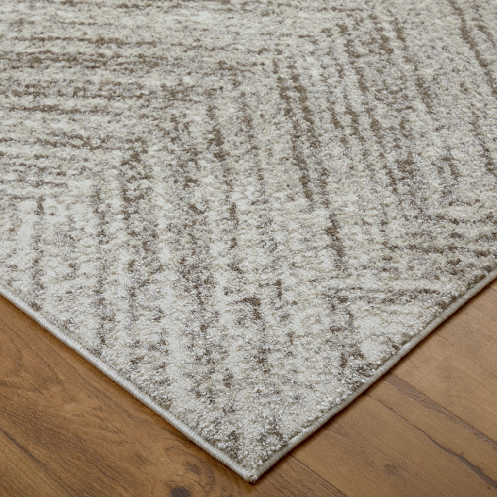 9" X 12" Ivory and Brown Geometric Power Loom Area Rug