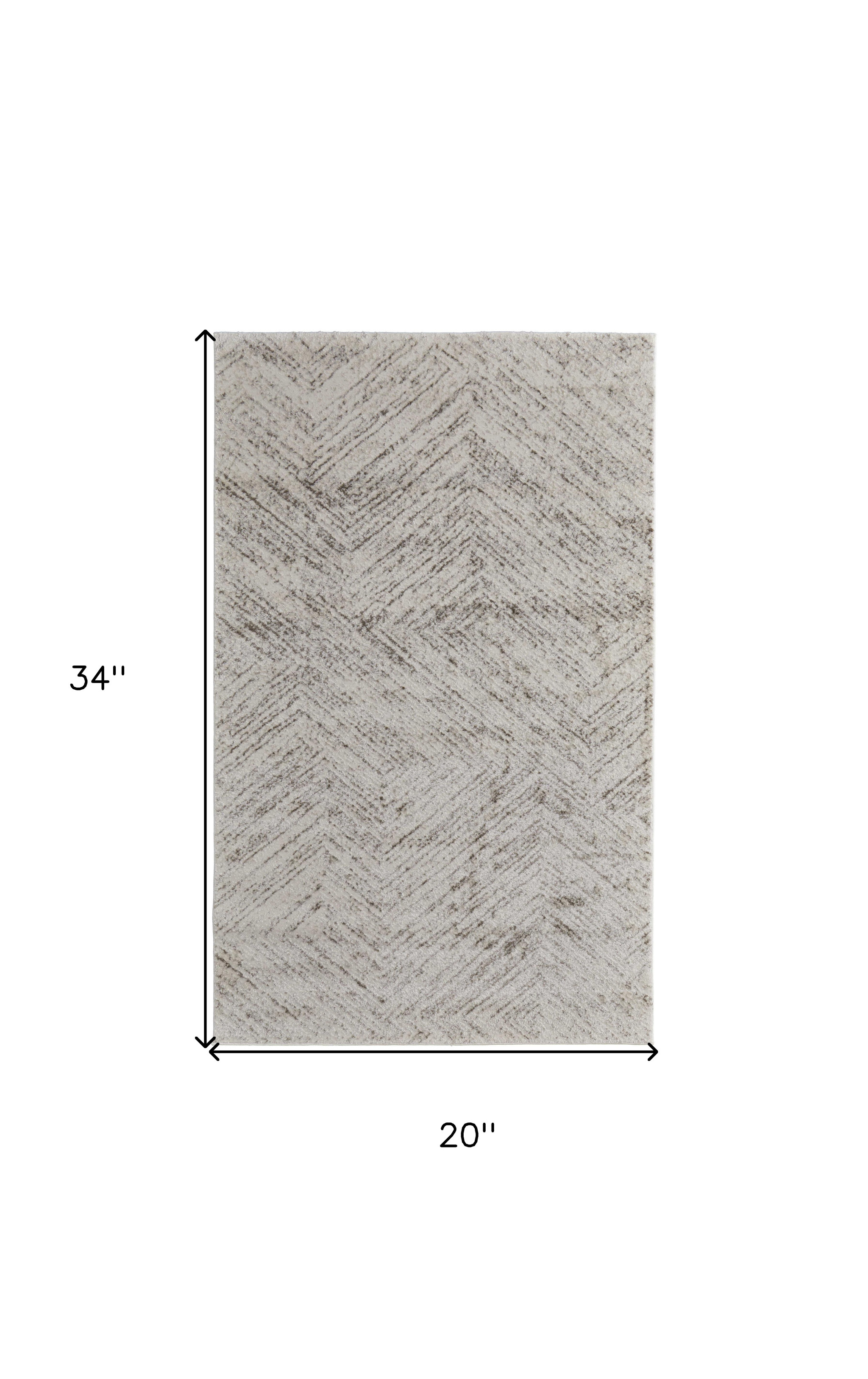 2" X 3" Ivory and Brown Geometric Power Loom Area Rug