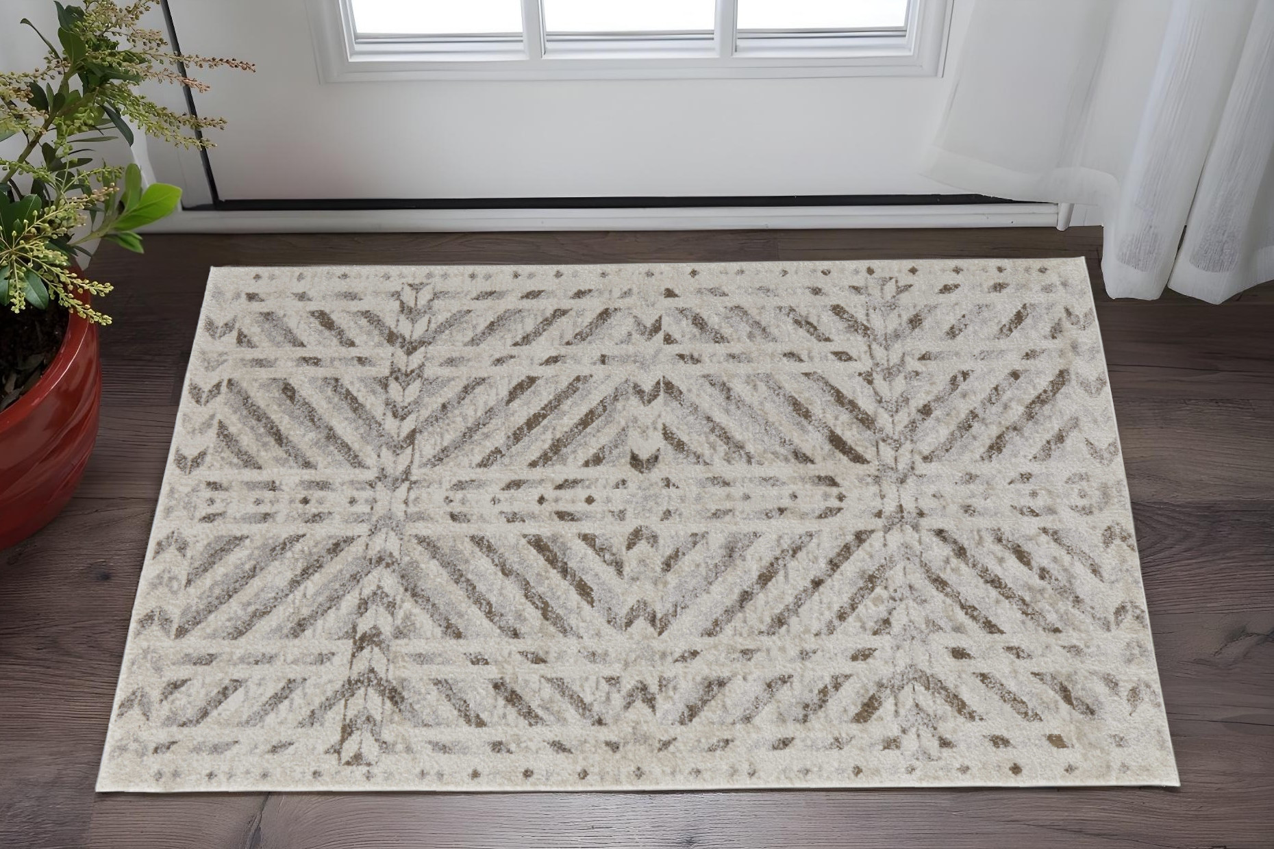 2" X 3" Ivory and Brown Geometric Power Loom Area Rug