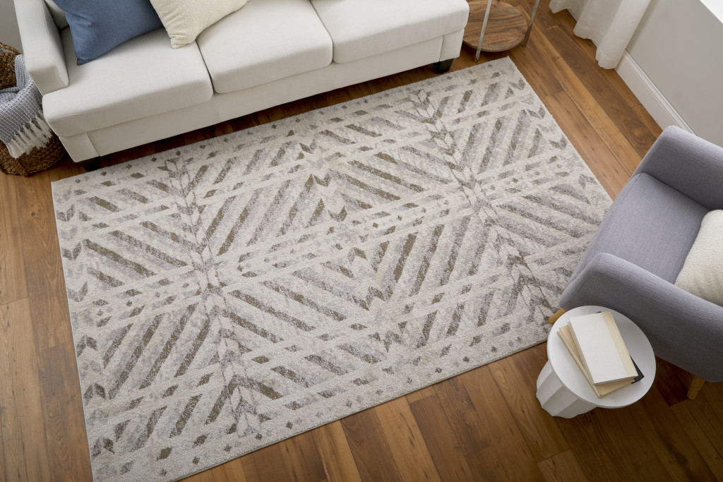 2" X 3" Ivory and Brown Geometric Power Loom Area Rug
