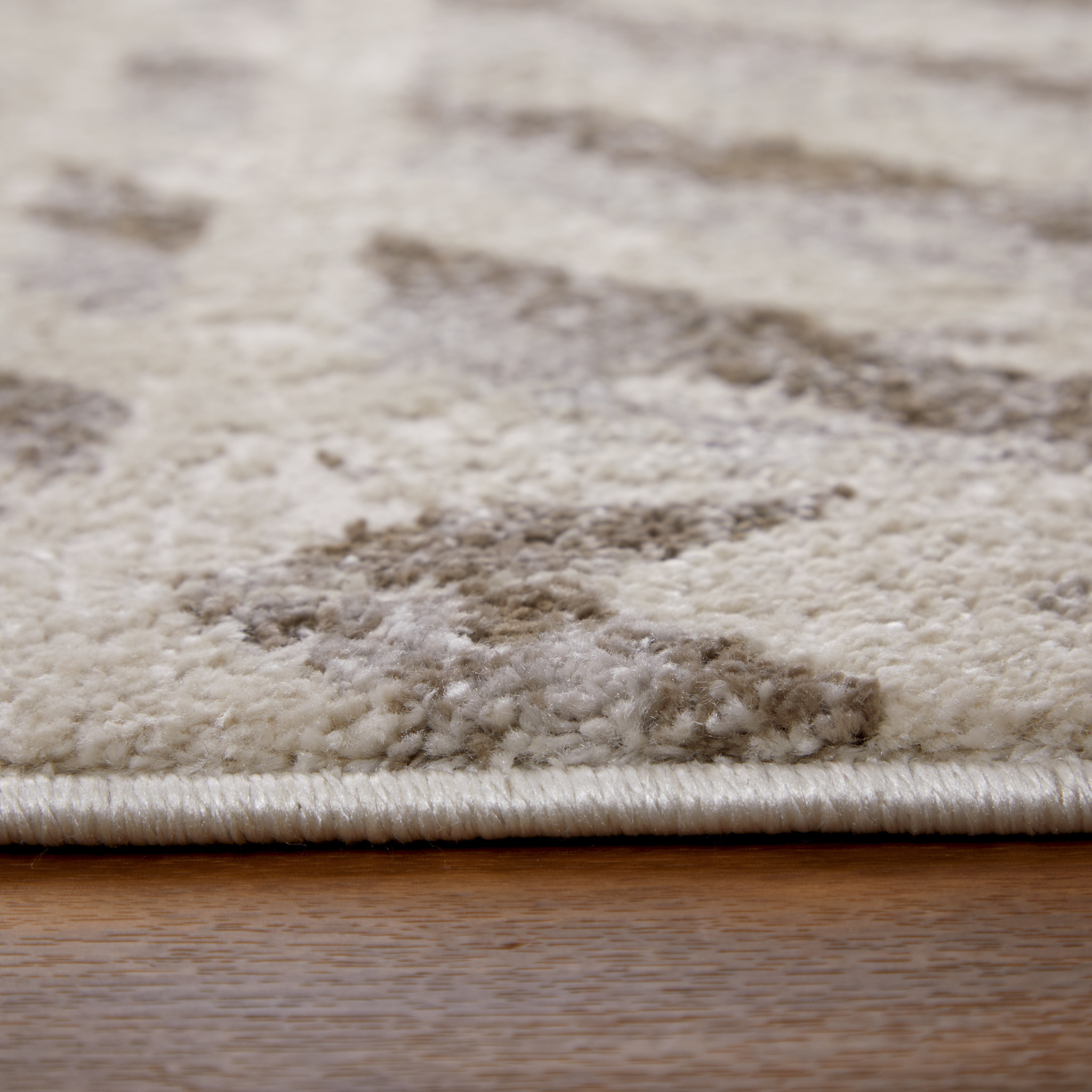 2" X 3" Ivory and Brown Geometric Power Loom Area Rug