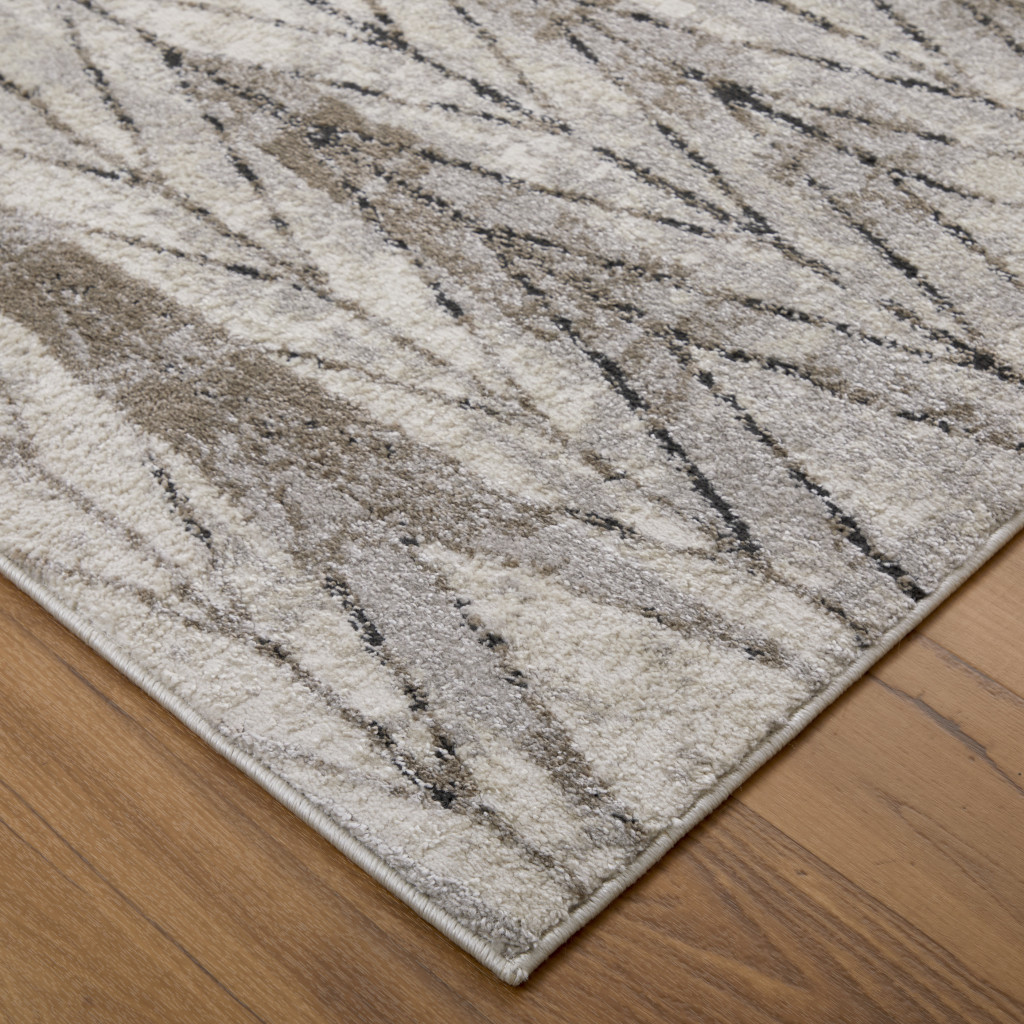 2" X 3" Ivory and Brown Geometric Power Loom Area Rug