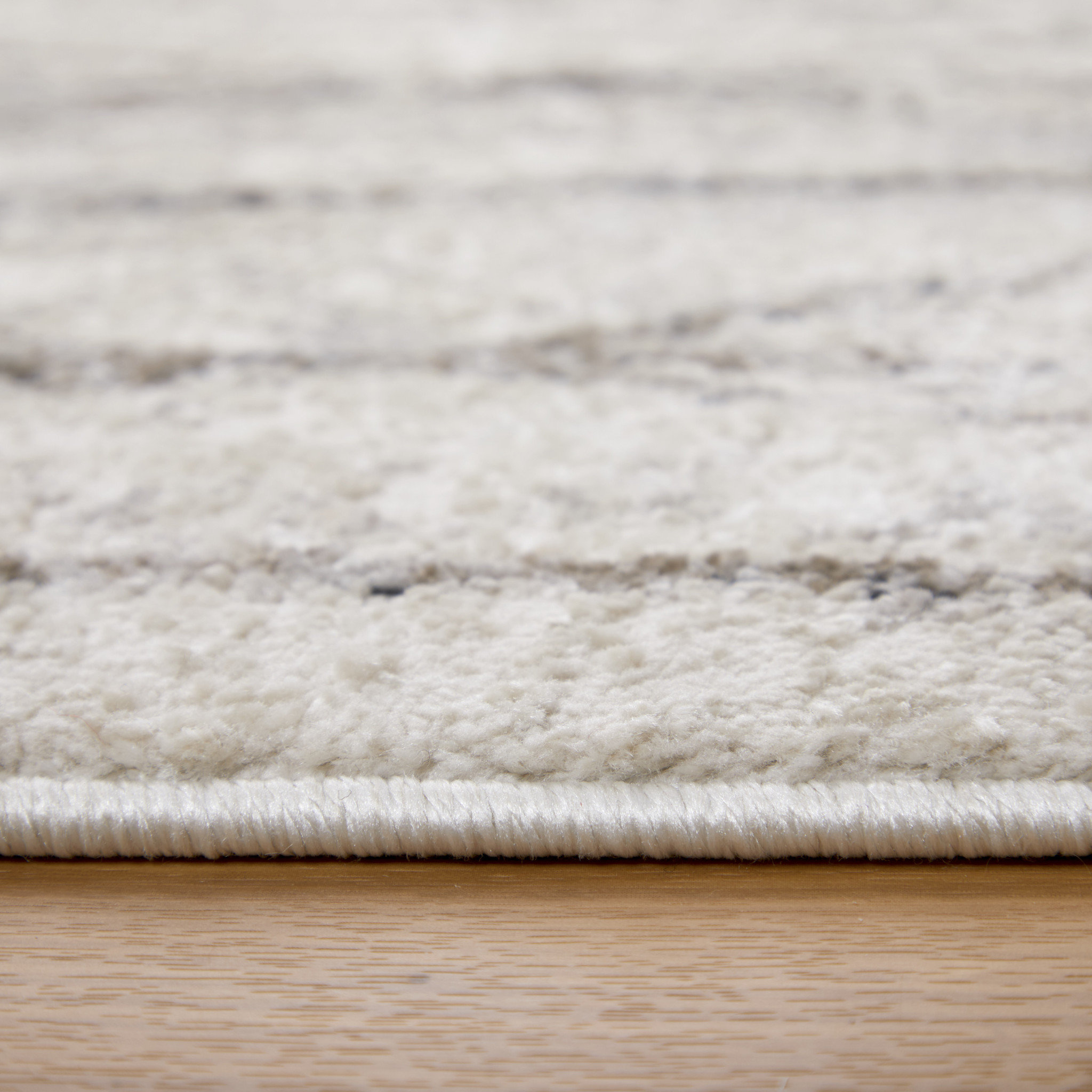 2" X 3" Ivory and Brown Geometric Power Loom Area Rug