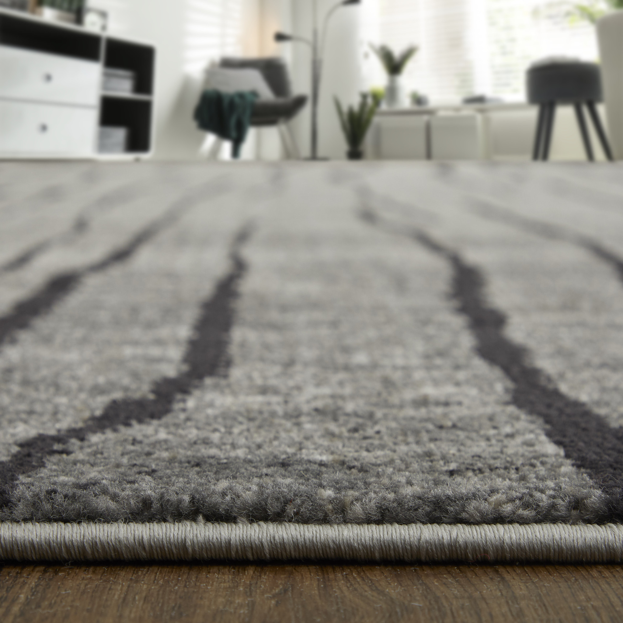 2" X 3" Black and Gray Abstract Power Loom Area Rug