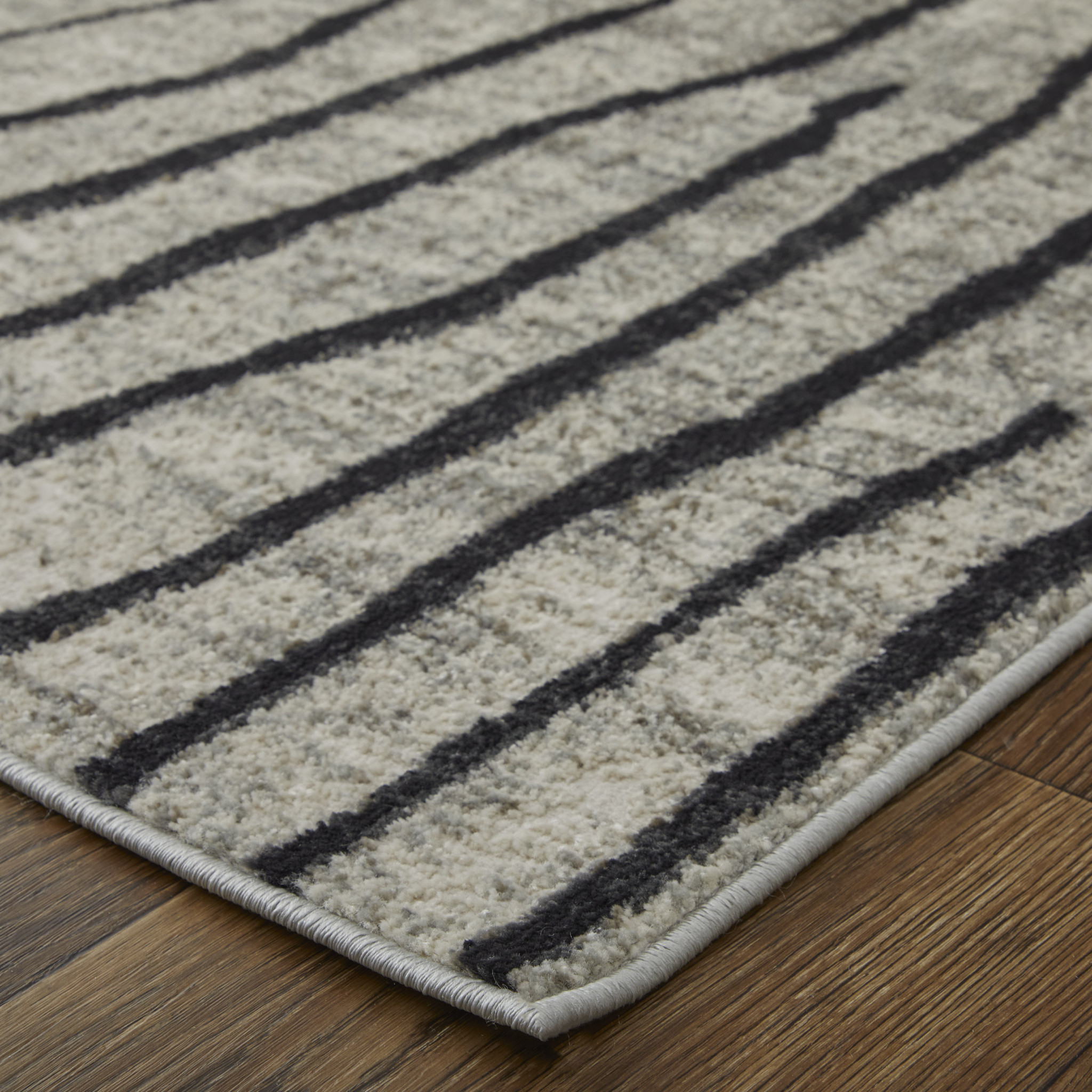 2" X 3" Black and Gray Abstract Power Loom Area Rug