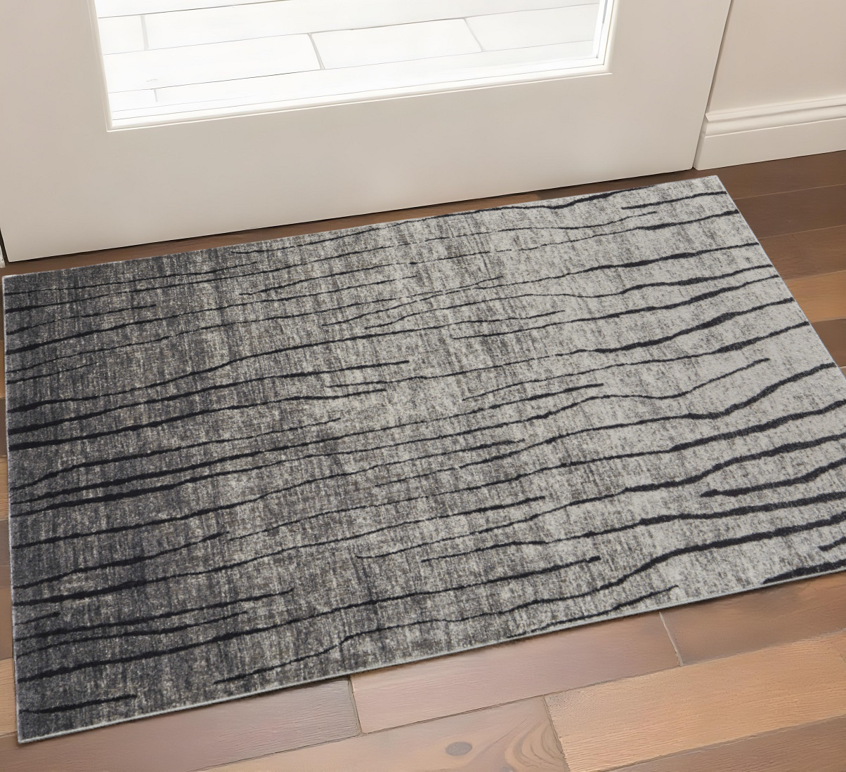 2" X 3" Black and Gray Abstract Power Loom Area Rug