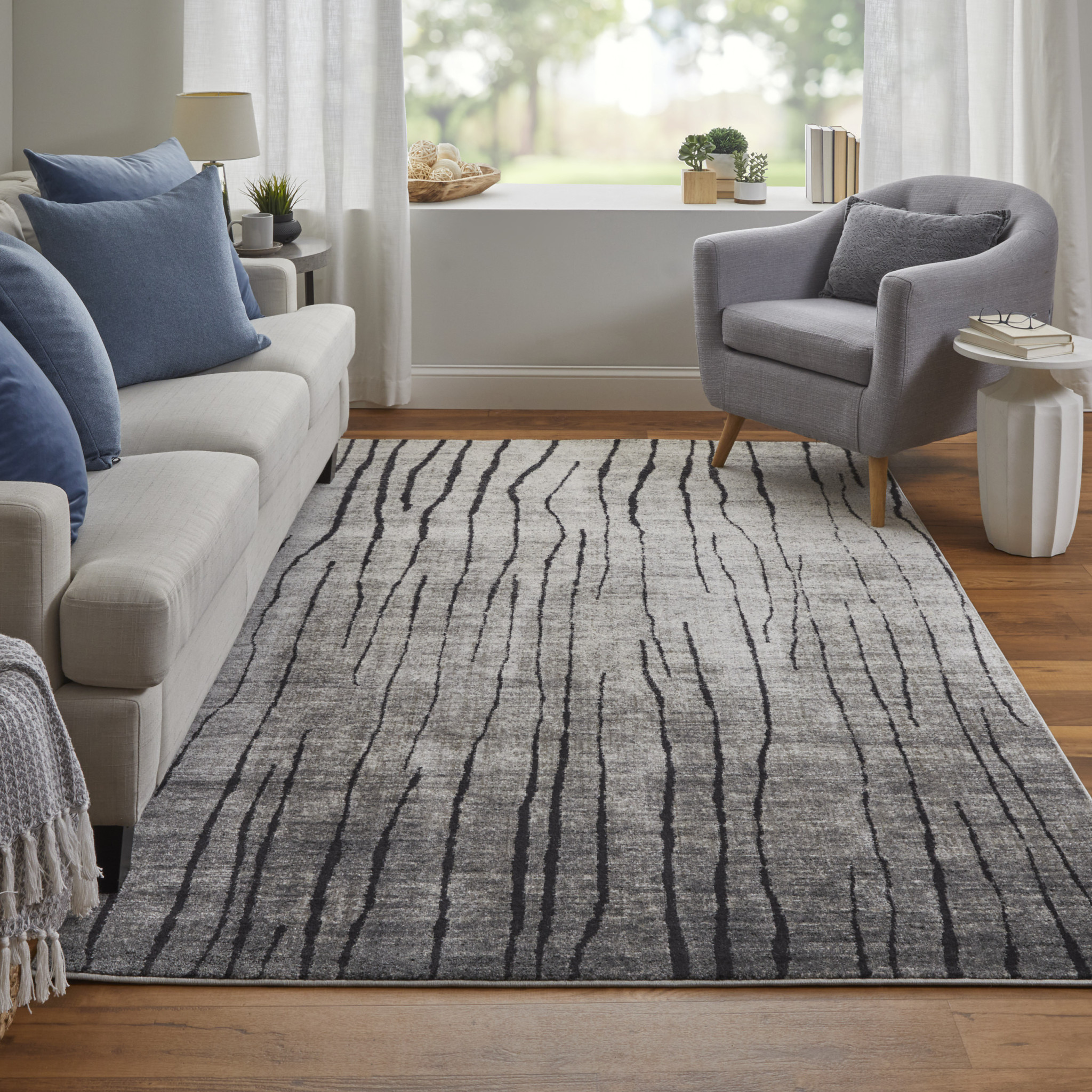 2" X 3" Black and Gray Abstract Power Loom Area Rug