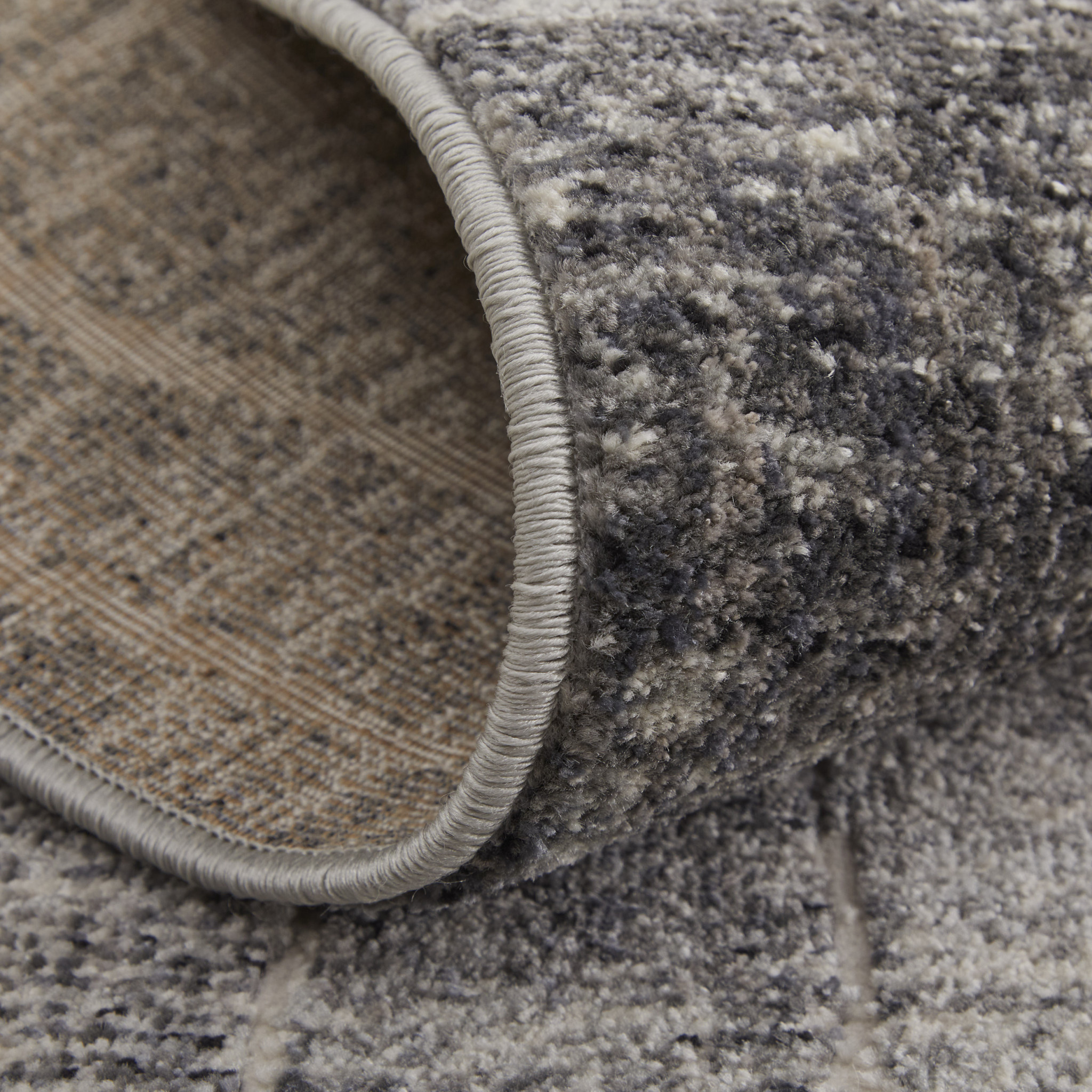 2" X 3" Black Gray and Ivory Abstract Power Loom Area Rug