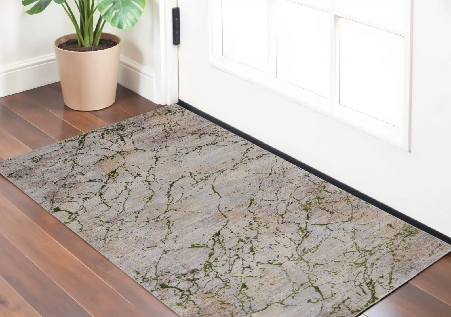 2" X 3" Taupe Green and Tan Abstract Power Loom Area Rug