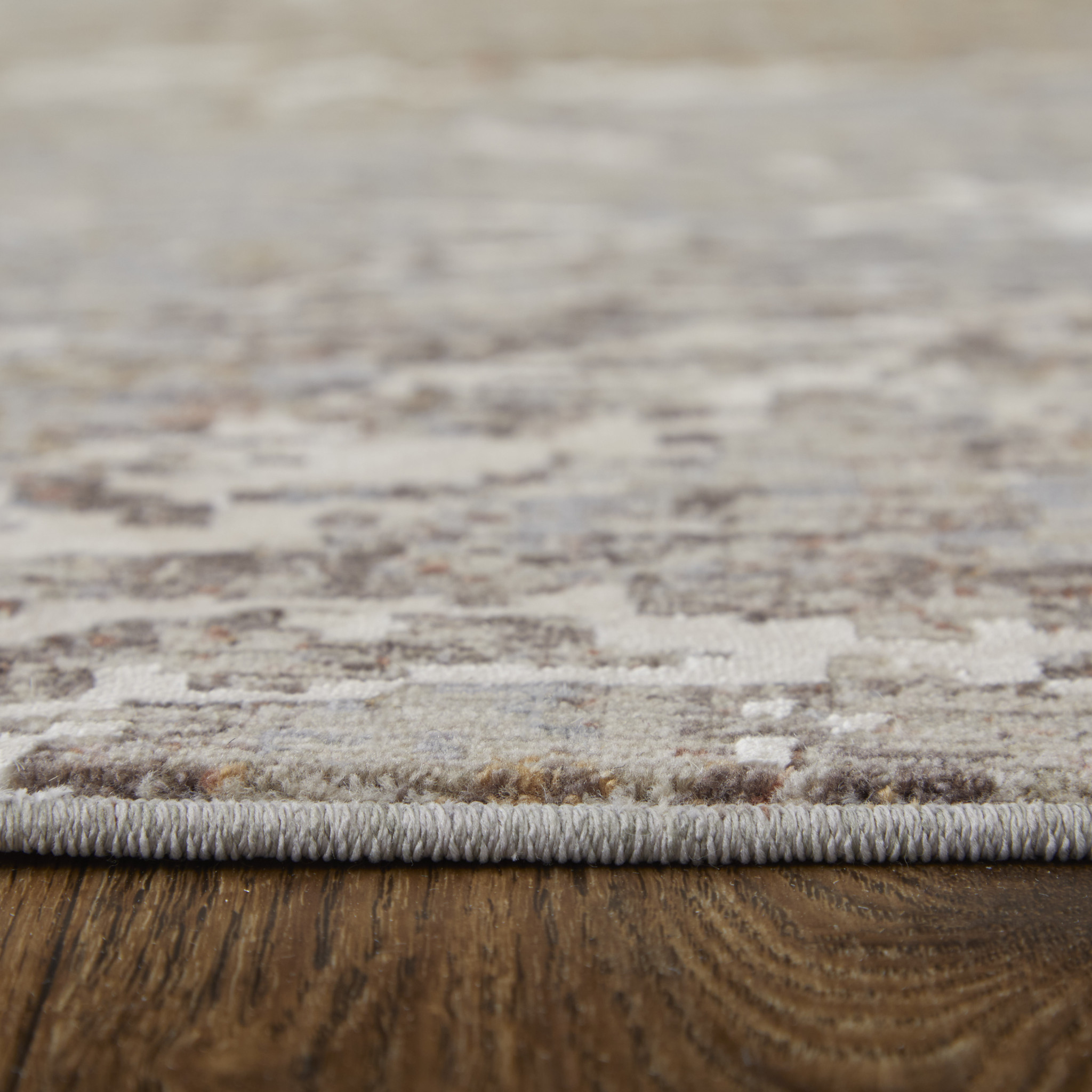 2" X 3" Taupe Brown and Ivory Abstract Power Loom Area Rug