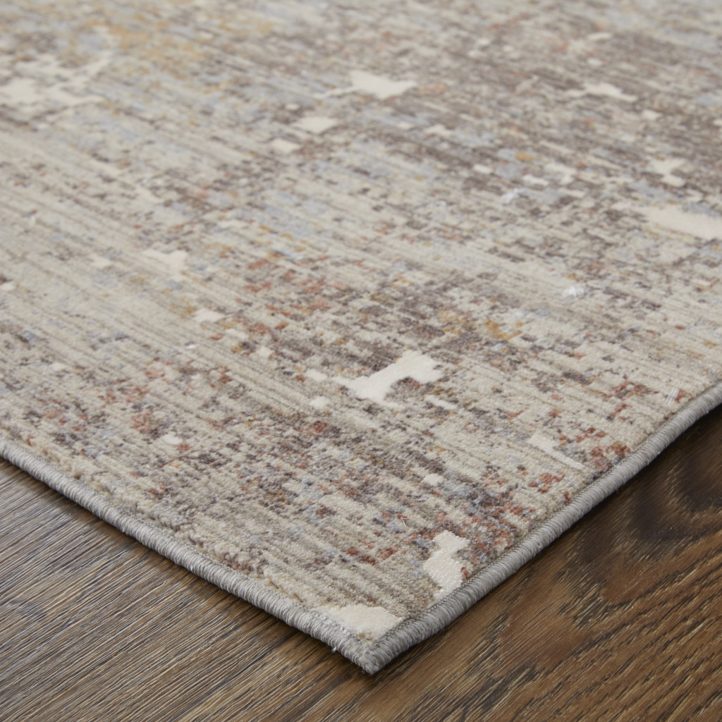2" X 3" Taupe Brown and Ivory Abstract Power Loom Area Rug