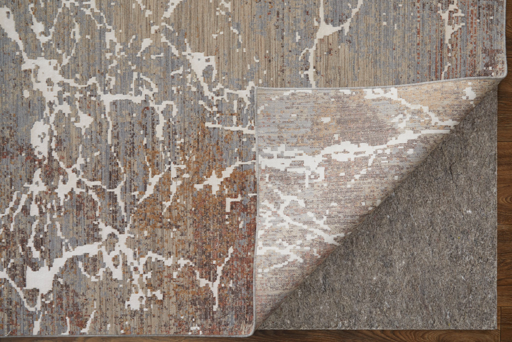 2" X 3" Taupe Brown and Ivory Abstract Power Loom Area Rug